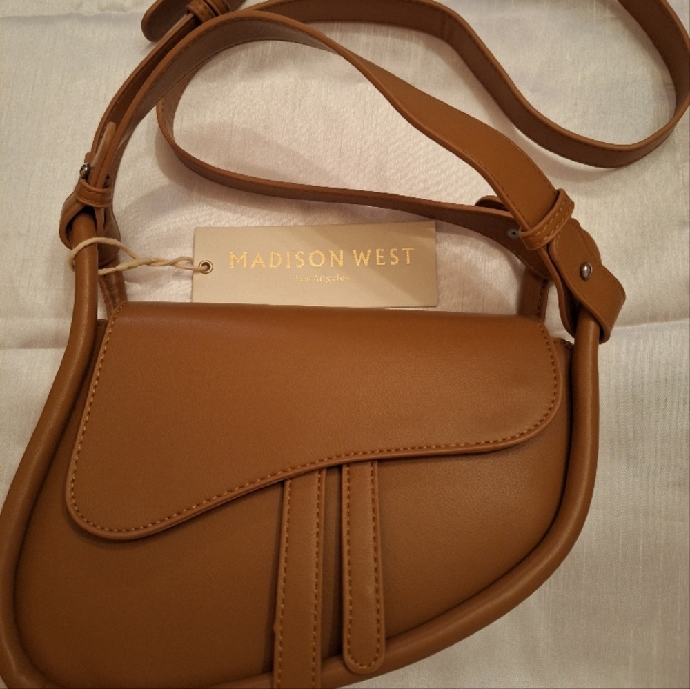 Madison West Crossbody Bag. Tan. Top Handle and crossbody strap.